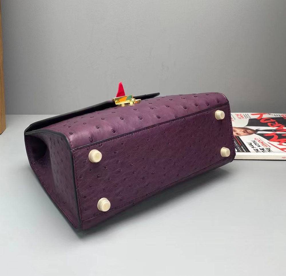 Borsa a mano con manico superiore in vera pelle di struzzo, viola