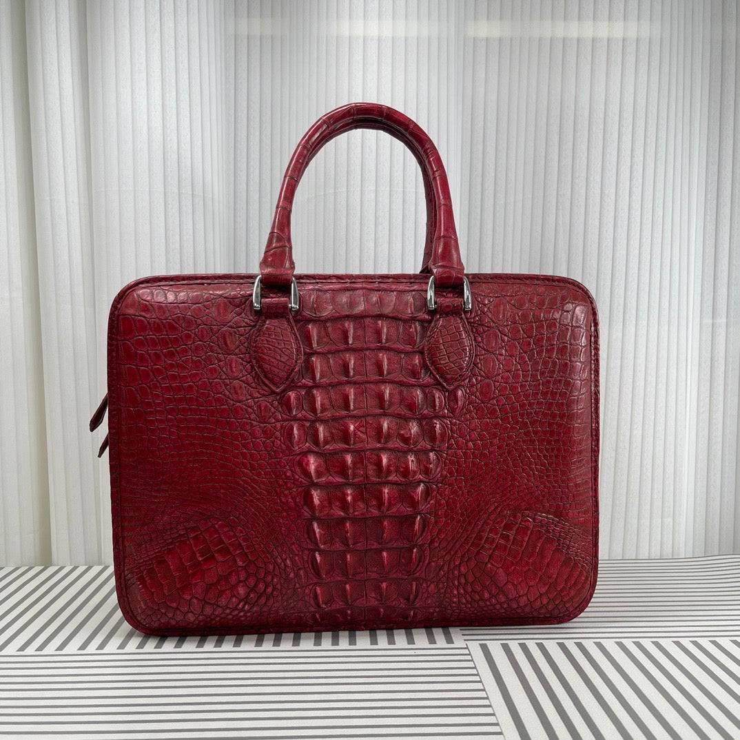 Borsa ventiquattrore da uomo in pelle di coccodrillo rosso e marrone