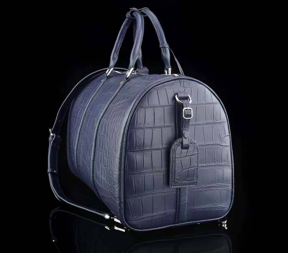 Borsoni da viaggio da uomo in vera pelle di coccodrillo opaca blu scuro