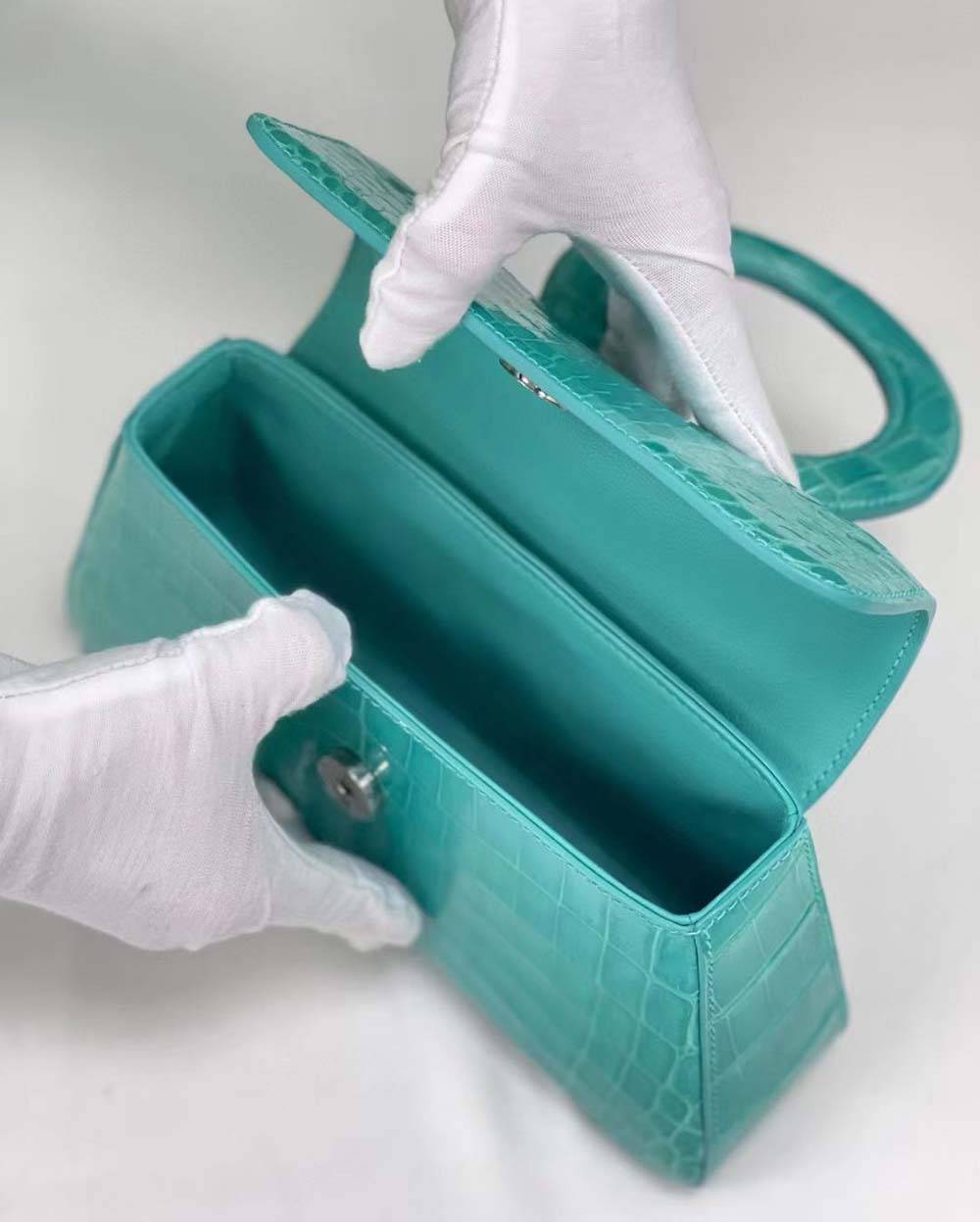 Borsa da donna mini a tracolla con manico rotondo in pelle effetto coccodrillo lucida
