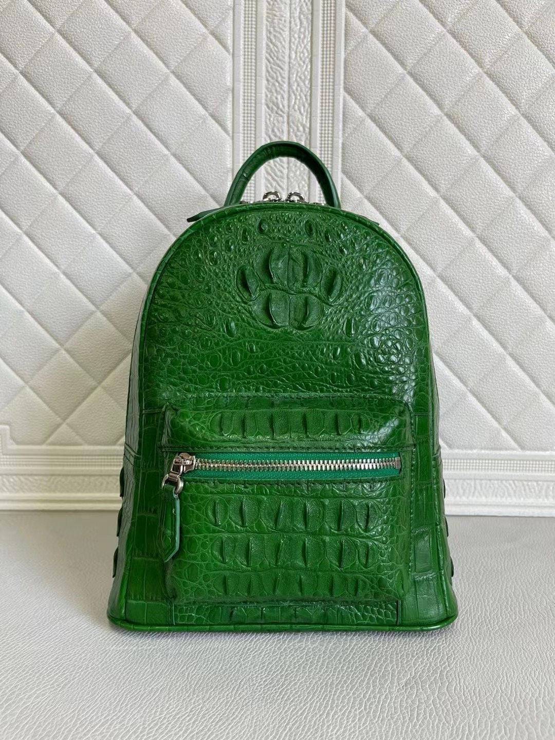 Zaino da donna in pelle di coccodrillo verde scuro e verde chiaro