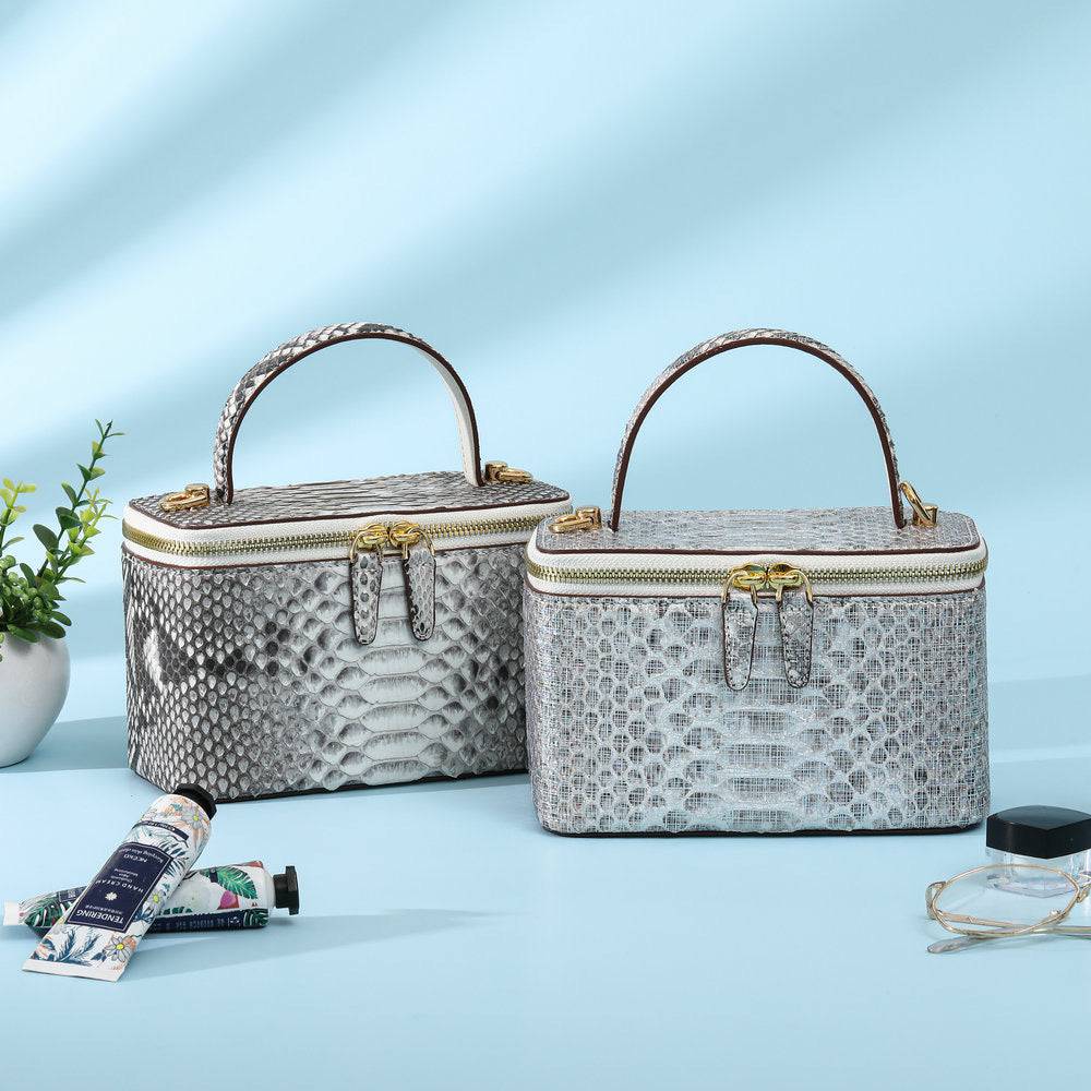 Borsa cosmetica da donna in pelle stampa pitone, con manico superiore e tracolla