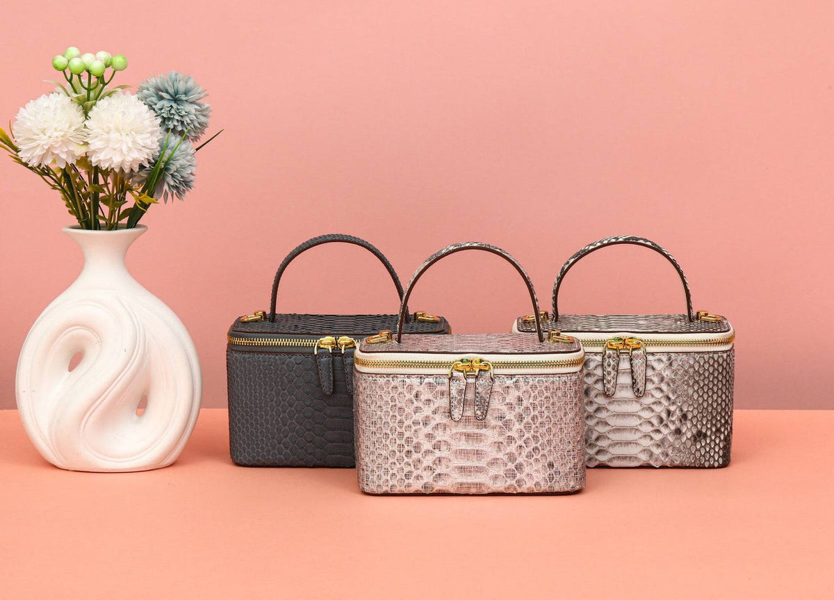 Borsa da donna in pelle stampa pitone con manico superiore, a tracolla, per cosmetici